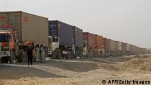 Container trucks are queued up as they wait to enter Afghanistan at the Pakistan's border town of Chaman on August 30, 2021. (Photo by - / AFP) (Photo by -/AFP via Getty Images)
