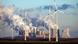 Wind turbines in front of a coal plant in Germany Wind turbines in front of a coal plant in Germany