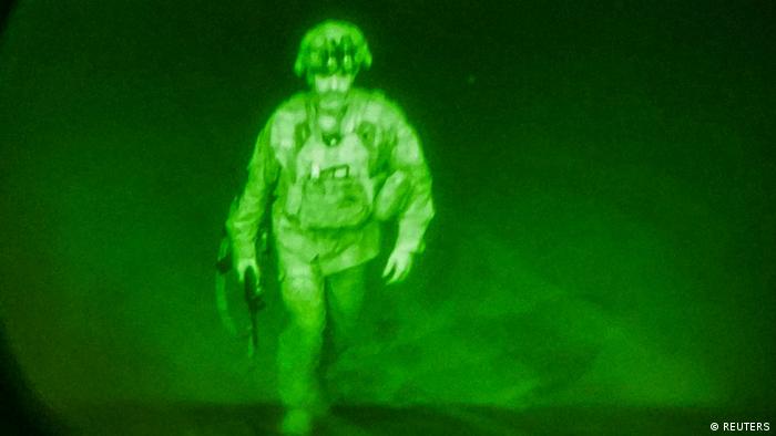  Major General Chris Donahue seen with night vision boarding a plane to leave Kabul