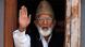 Kashmiri separatist leader Syed Ali Shah Geelani waves to the media Kashmiri separatist leader Syed Ali Shah Geelani waves to the media