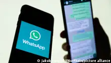WhatsApp logo displayed on a phone screen and conversation on the WhatsApp displayed on a phone screen in the background are seen in this illustration photo taken in Krakow, Poland on August 27, 2021. (Photo Illustration by Jakub Porzycki/NurPhoto)