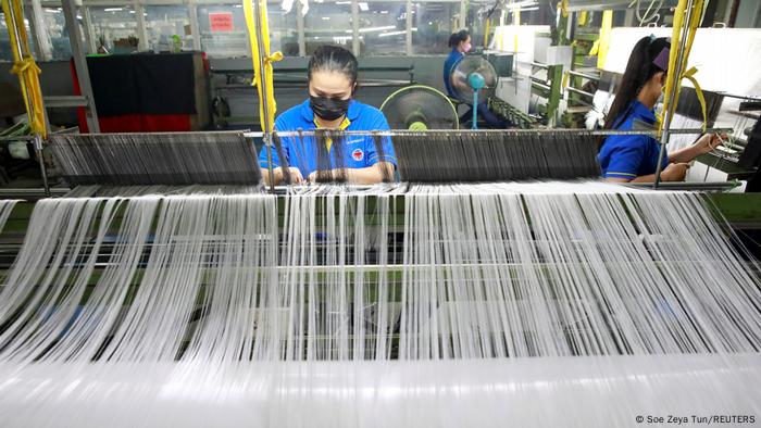 A woman weaving 