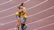 Los alemanes Johannes Floors y Irmgard Bensusan celebran su medalla de oro en 400 metros. Los alemanes Johannes Floors y Irmgard Bensusan celebran su medalla de oro en 400 metros.