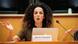 Masih Alinejad sits behind a piece of paper that bears her name, an open MacBook Masih Alinejad sits behind a piece of paper that bears her name, an open MacBook
