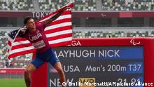 United States' Nick Mayhugh celebrates after winning the men's T37 200-meters final during the 2020 Paralympics in Tokyo, Saturday, Sept. 4, 2021. (AP Photo/Emilio Morenatti)