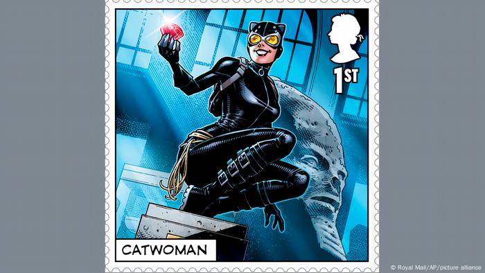 A postage stamp with Catwoman with a ruby ​​in her hand.