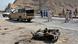 Security officials examine the site of suicide bombing in a checkpoint on the outskirts of Quetta Security officials examine the site of suicide bombing in a checkpoint on the outskirts of Quetta