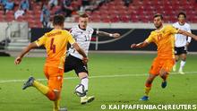 Soccer Football - World Cup - UEFA Qualifiers - Group J - Germany v Armenia - Mercedes-Benz Arena, Stuttgart, Germany - September 5, 2021 Germany's Marco Reus scores their third goal REUTERS/Kai Pfaffenbach