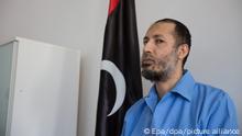 epa05056719 Saadi Gaddafi, son of former Libyan leader Muammar Gaddafi, waits beore a trial session at a courtroom in Tripoli, Libya, 06 December 2015. Saadi Gaddafi is facing charges of murdering a soccer player in 2005. He fled the country after the fall of his father's regime and was extradited from Niger to Libya in March 2014. EPA/STRINGER ++ +++ dpa-Bildfunk +++