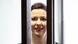 Maria Kolesnikova as seen through the bars of a cage during her trial in Belarus Maria Kolesnikova as seen through the bars of a cage during her trial in Belarus