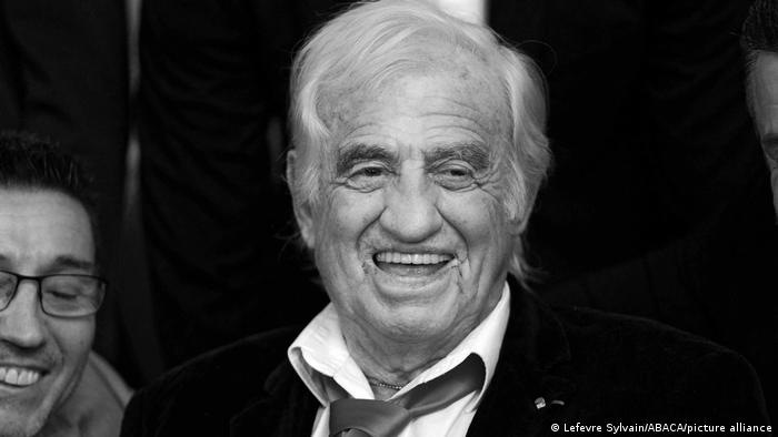 A black and white photo of Jean-Paul Belmondo in 2019