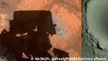 This pair of August 2021 images made available by NASA shows the drill hole from Perseverance’s first sample-collection attempt on Mars. NASA is blaming unusually soft rock for last week’s sampling fiasco on Mars. The Perseverance rover came up empty after attempting to collect its first core sample on the red planet for eventual return to Earth. Data beamed back on Friday, Aug. 6, 2021 showed that the rover drilled to the proper depth of nearly 3 inches (8 centimeters), and pictures of the borehole looked good. But it quickly became clear the sample tube was empty. (NASA/JPL-Caltech/MSSS via AP)