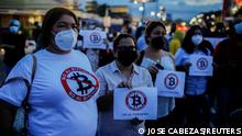 People take part in a protest against the detention of cryptocurrency commentator Mario Gomez, and against the use of Bitcoin as legal tender, in San Salvador, El Salvador, September 1, 2021. REUTERS/Jose Cabezas