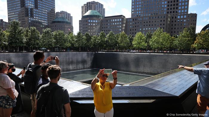 People gather at Ground Zero to take pictures