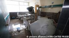 Flooded rooms and damaged beds and equipment are seen in the public hospital in Tula, Hidalgo state, Mexico, Tuesday, Sept. 7, 2021. Torrential rains in central Mexico suddenly flooded a hospital in Tula, killing more than a dozen patients, with about 40 other surviving as waters rose swiftly and flooded the public hospital. (AP Photo/Marco Ugarte)