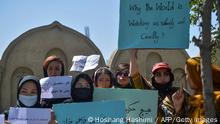 Afghan women hold banners and placards as they take part in an anti-Pakistan protest in Kabul on September 8, 2021. (Photo by Hoshang Hashimi / AFP) (Photo by HOSHANG HASHIMI/AFP via Getty Images)