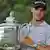 Martin Kaymer poses with a trophy