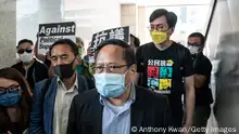 HONG KONG, CHINA - APRIL 01: Pro-democracy activist and former lawmaker Albert Ho leaves the West Kowloon Magistrates Courts following a hearing on April 1, 2021 in Hong Kong, China. Seven prominent democratic figures, including Apple Daily founder Jimmy Lai, former lawmaker and barrister Martin Lee and Margaret Ng, were convicted of unauthorized assembly in relation to a peaceful protest on Aug. 18 in 2019. (Photo by Anthony Kwan/Getty Images)