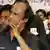 Tamil film actors Rajnikanth, left, and Ajith Kumar, look on at a day-long fast to express their solidarity with the Tamils in Sri Lanka, in Chennai, India, Saturday, Nov. 1, 2008. (AP Photo)