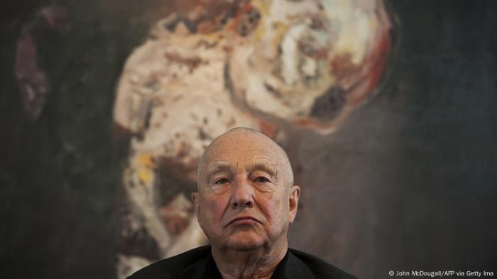 Georg Baselitz in front of a large painting