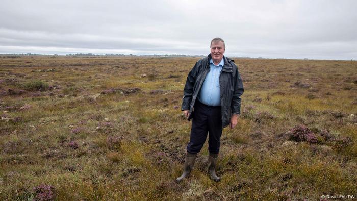 Paul Connaughton stands on the Carrownagappul bog in Ireland 