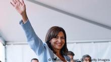 TOPSHOT - The mayor of Paris, member of the French Socialist Party (Parti Socialiste - PS) Anne Hidalgo waves in Rouen, western France, on September 12, 2021 after announcing that she plans to stand as a PS candidate in next year's presidential elections. (Photo by Thomas SAMSON / AFP) (Photo by THOMAS SAMSON/AFP via Getty Images)