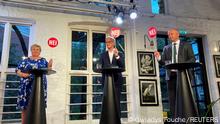 The three candidates for Norway's prime minister Erna Solberg from the Conservatives, Jonas Gahr Stoere from Labour Party and Trygve Slagsvold Vedum from the Centre Party attend a debate in central Oslo, Norway August 9, 2021. Picture taken August 9, 2021. REUTERS/Gwladys Fouche