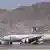 A Pakistan International Airlines plane carrying a handful of passengers at Kabul airport