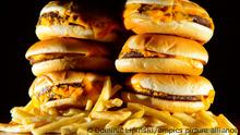 Junk food advertising. File photo dated 09/07/14 of a pile of cheeseburgers and french fries, as teenagers are more than twice as likely to be obese if they can remember seeing a junk food advert every day, according to a report. Issue date: Thursday March 15, 2018. Cancer Research UK found the obesity risk doubled for teens who could recall seeing such campaigns on any advertising platform every day compared with those who could not remember seeing any in the last month. See PA story CONSUMER JunkFood. Photo credit should read: Dominic Lipinski/PA Wire URN:35529016