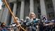 Virginia Roberts Giuffre, center, who says she was trafficked by sex offender Jeffrey Epstein, holds a news conference outside a Manhattan court Virginia Roberts Giuffre, center, who says she was trafficked by sex offender Jeffrey Epstein, holds a news conference outside a Manhattan court