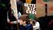 Kind mit Schild "Rettet Die Erde" auf einer Demonstration (2019) Kind mit Schild "Rettet Die Erde" auf einer Demonstration (2019)
