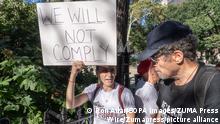 September 4, 2021, New York, United States: Protester holds a placard that reads ''We Will Not Comply'' outside of Madison Square Park at a Freedom Rally against vaccination mandates in New York City. (Credit Image: © Ron Adar/SOPA Images via ZUMA Press Wire