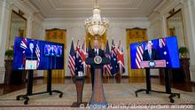 President Joe Biden, joined virtually by Australian Prime Minister Scott Morrison and British Prime Minister Boris Johnson, speaks about a national security initiative from the East Room of the White House in Washington