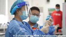 Coronavirus digest: China vaccinates nearly 1 billion