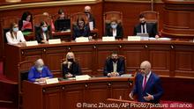 Albanian Prime Minister Edi Rama speaks during a debate at the parliament in Tirana, Albania, Thursday, Sept. 16, 2021. Albania's parliament was to vote late Thursday to approve the new, female-dominated Cabinet of Prime Minister Edi Rama, with 12 of the 17 jobs going to women, propelling Albania to the top of global rankings in terms of the percentage of women holding Cabinet positions. (AP Photo/Franc Zhurda)