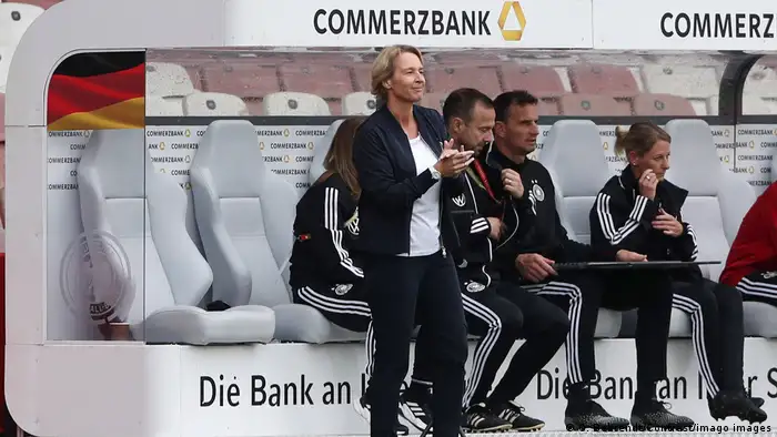 Germany coach Martina Voss-Tecklenburg watches on from the bench