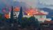 Lava flows behind a house following the eruption of a volcano in the Cumbre Vieja national park Lava flows behind a house following the eruption of a volcano in the Cumbre Vieja national park