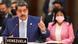 Maduro raises his figure, as he sits at summit desk Maduro raises his figure, as he sits at summit desk