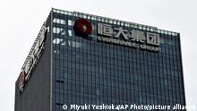 A picture taken on August 2021 shows the headquarters building of Evergrande Group in Shenzhen, Guangdong Province, China. The group is in financial crisis and the markets are watching the impact on the Chinese and global economy.　( The Yomiuri Shimbun via AP Images )