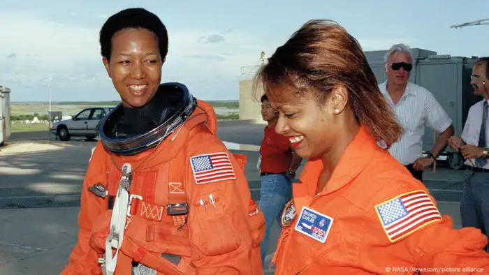 Mae Jemison (left) and Sharon McDougle, a spacesuit technician, photographed in 1992