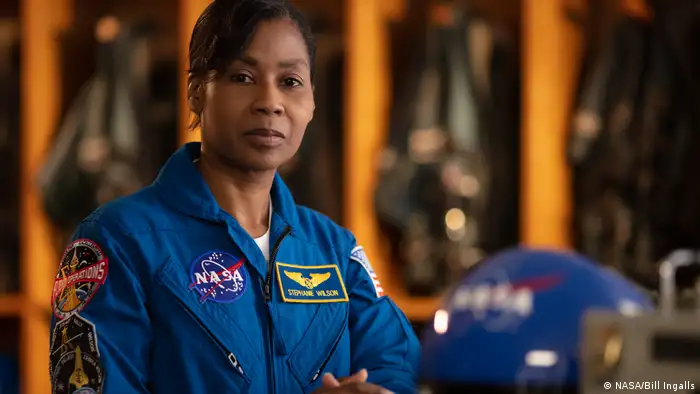 Stephanie Wilson in a NASA jumpsuit