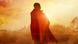 A still from the film 'I am Samuel' showing a man wrapped in a blanket with the sun shining behind him A still from the film 'I am Samuel' showing a man wrapped in a blanket with the sun shining behind him