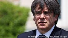 Exiled former Catalan leader and member of European Parliament Carles Puigdemont (R) speak during a press conference with newly appointed Catalan regional president Pere Aragones at Casa de la Republica in Waterloo on June 18, 2021. (Photo by Kenzo TRIBOUILLARD / AFP) (Photo by KENZO TRIBOUILLARD/AFP via Getty Images)