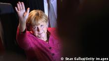 BERLIN, GERMANY - SEPTEMBER 21: German Chancellor and Chairwoman of the German Christian Democrats (CDU) Angela Merkel waves as she departs after speaking at a CDU election rally the day before federal elections on September 21, 2013 in Berlin, Germany. Germany faces federal elections on September 22 and so far the CDU has a strong lead in polls over the opposition. (Photo by Sean Gallup/Getty Images)