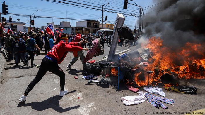 Repudian ataque a campamento de migrantes venezolanos en Chile | Las  noticias y análisis más importantes en América Latina | DW | 25.09.2021