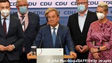 CDU leader and Chancellor candidate Armin Laschet speaks on stage at the Christian Democratic Union (CDU) headquarters after the estimates were broadcast on television in Berlin on September 26, 2021 after the German general elections. (Photo by John MACDOUGALL / AFP) (Photo by JOHN MACDOUGALL/AFP via Getty Images)