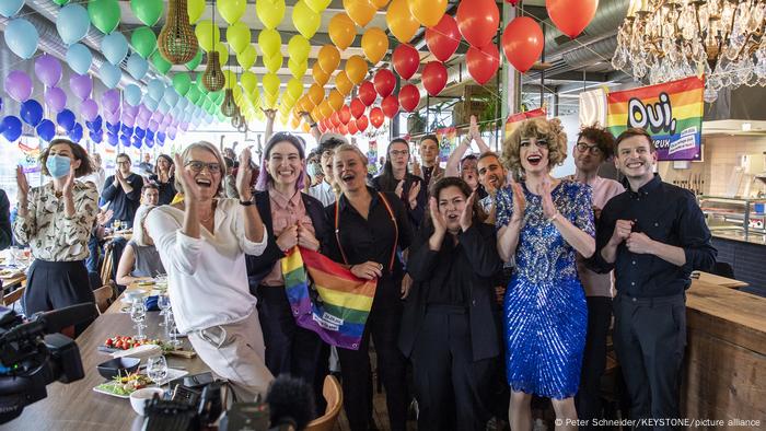 People celebrating in a bar