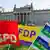 Les trois partis qui ont le vent en poupe pour constituer une coalition "feu tricolore" en Allemagne: Le SPD, le FDP et les écologistes de Bündnis 90/Die Grünen 