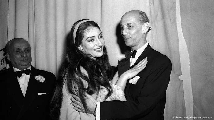 Maria Callas embraced by the Met's general manager Rudolf Bing.