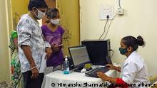 Indian People wait for verification on COWIN App for a dose of the Covishield Covid-19 coronavirus vaccine at a vaccination centre in Ajmer, Rajasthan, India on July 12, 2021. India on Tuesday recorded 32,906 new coronavirus infections, taking total tally of Covid-19 cases to 30,907,282, according to the Union health ministry update at 8am. The death toll climbed to 41,07,84with 2,020 fresh fatalities in the last 24 hours. Photo by Himanshu Sharma/ABACAPRESS.COM